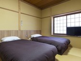 和洋室10畳+8畳+広縁4畳（改築／禁煙室）